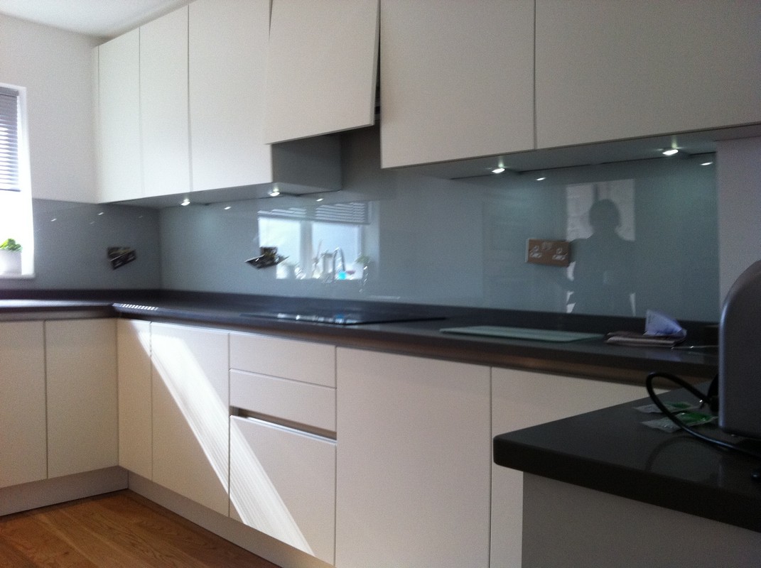 Grey glass kitchen splashback with LED lighting in Hatfield