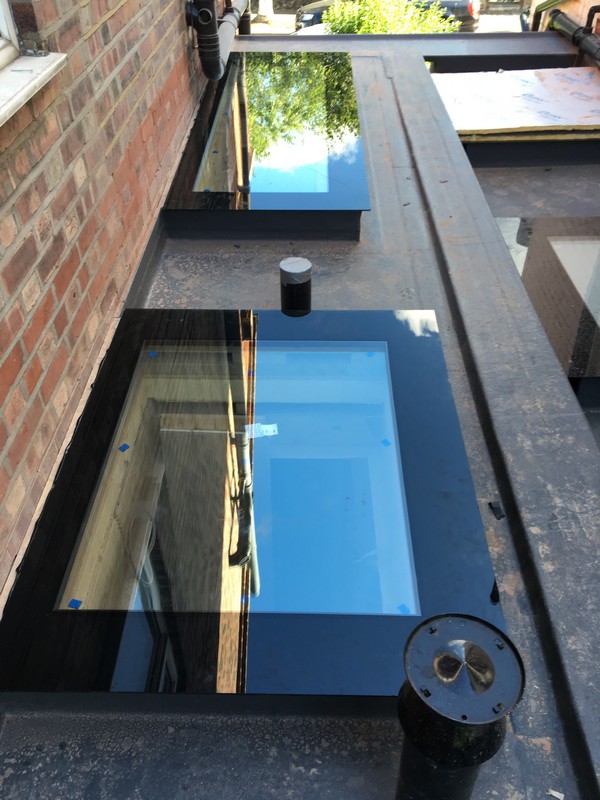 Multiple flat roof skylights on extension in Hatfield